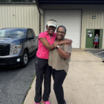Happy embrace in industrial area.