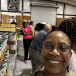 Happy team in a storage facility